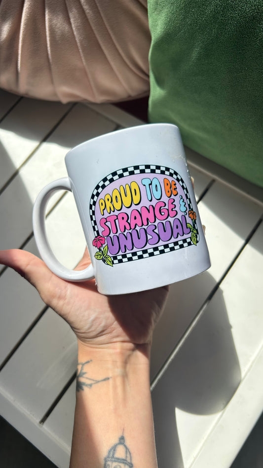 Proud to be strange and unusual mug