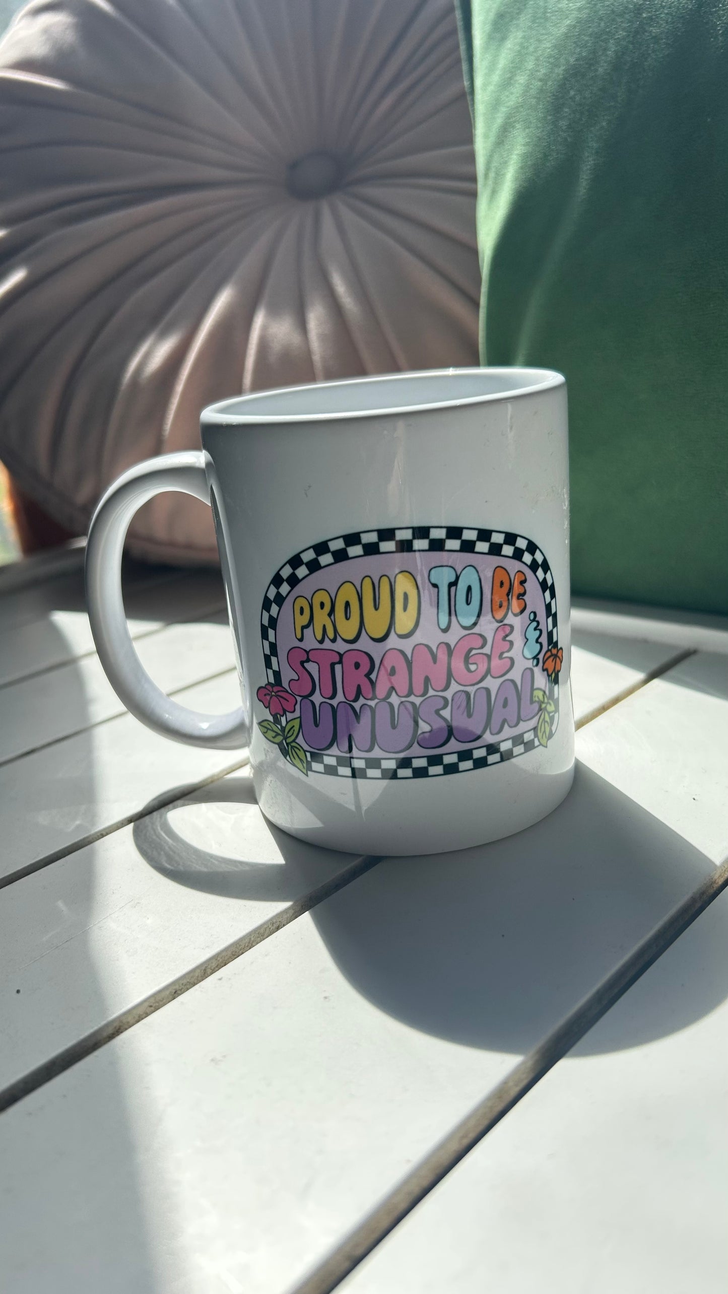 Proud to be strange and unusual mug